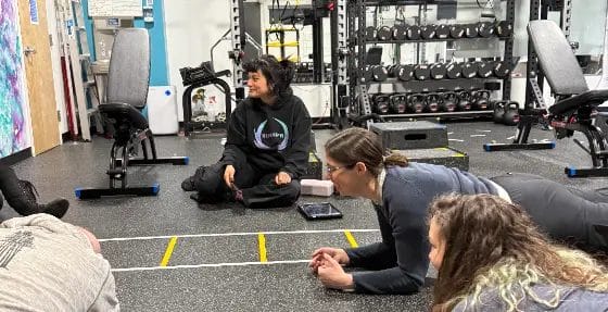 Reimagym introductory personal training session with coach guiding new member