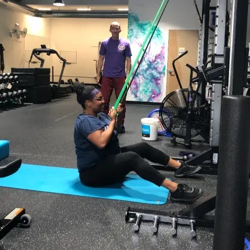 Personal training session at Reimagym with resistance bands