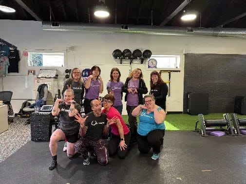 Reimagym members and coaches in training session at the gym